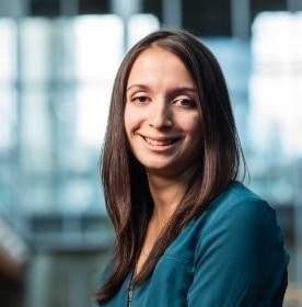 Smiling woman with long brown hair