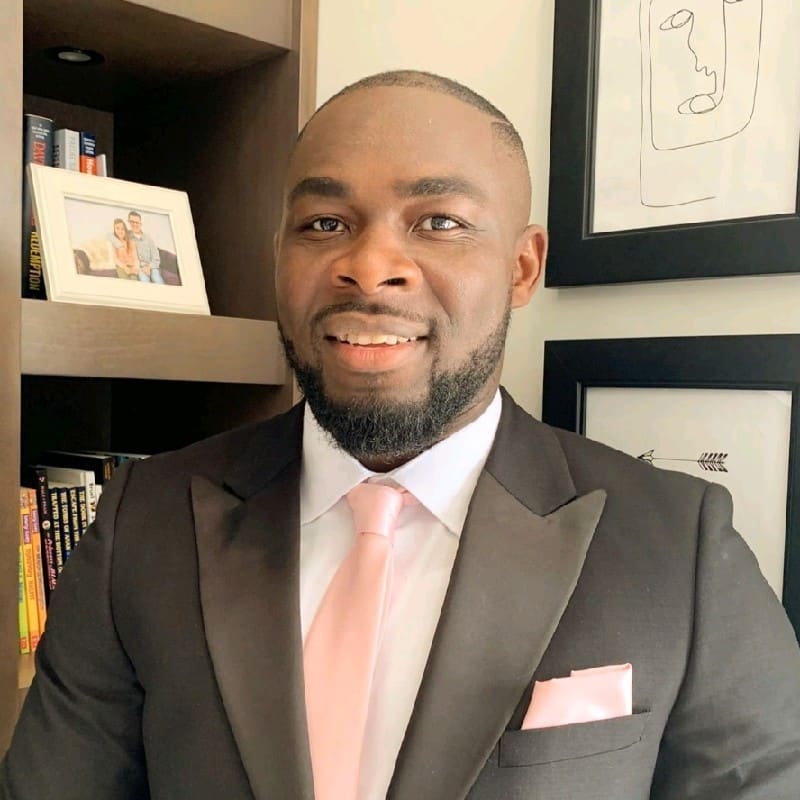 Man in suit with pink tie