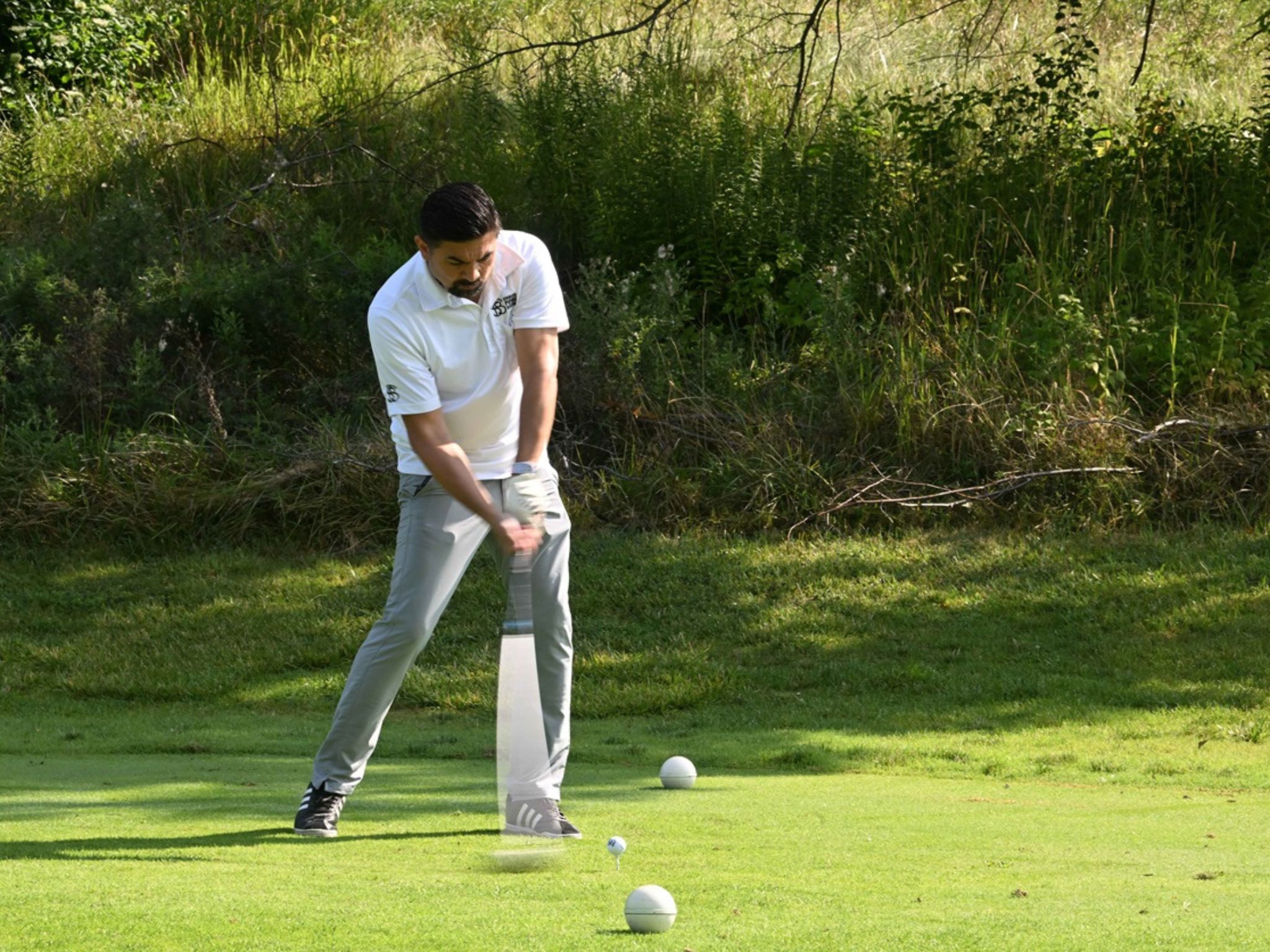 Golfer preparing to swing club