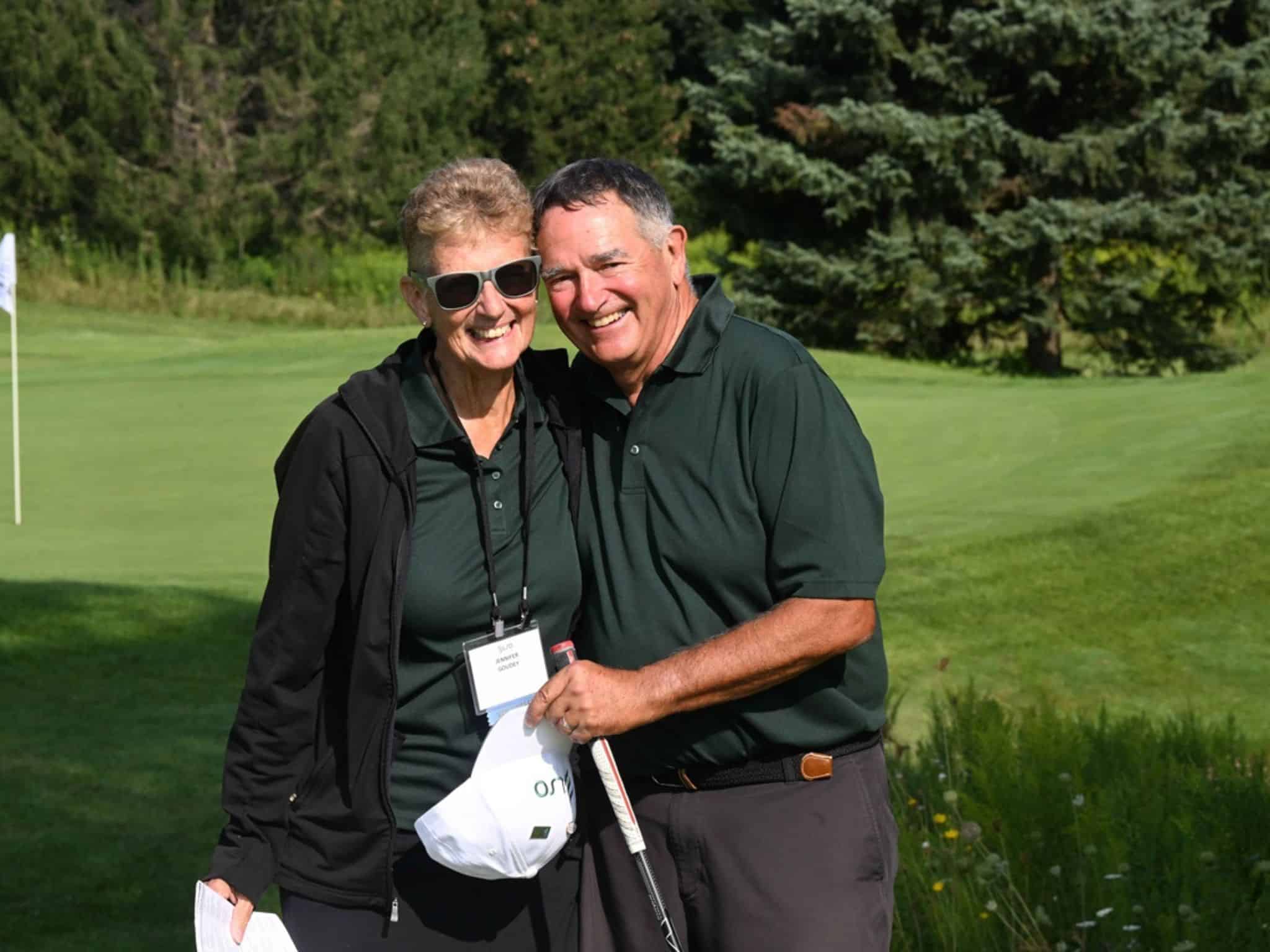 Happy couple on a golf course