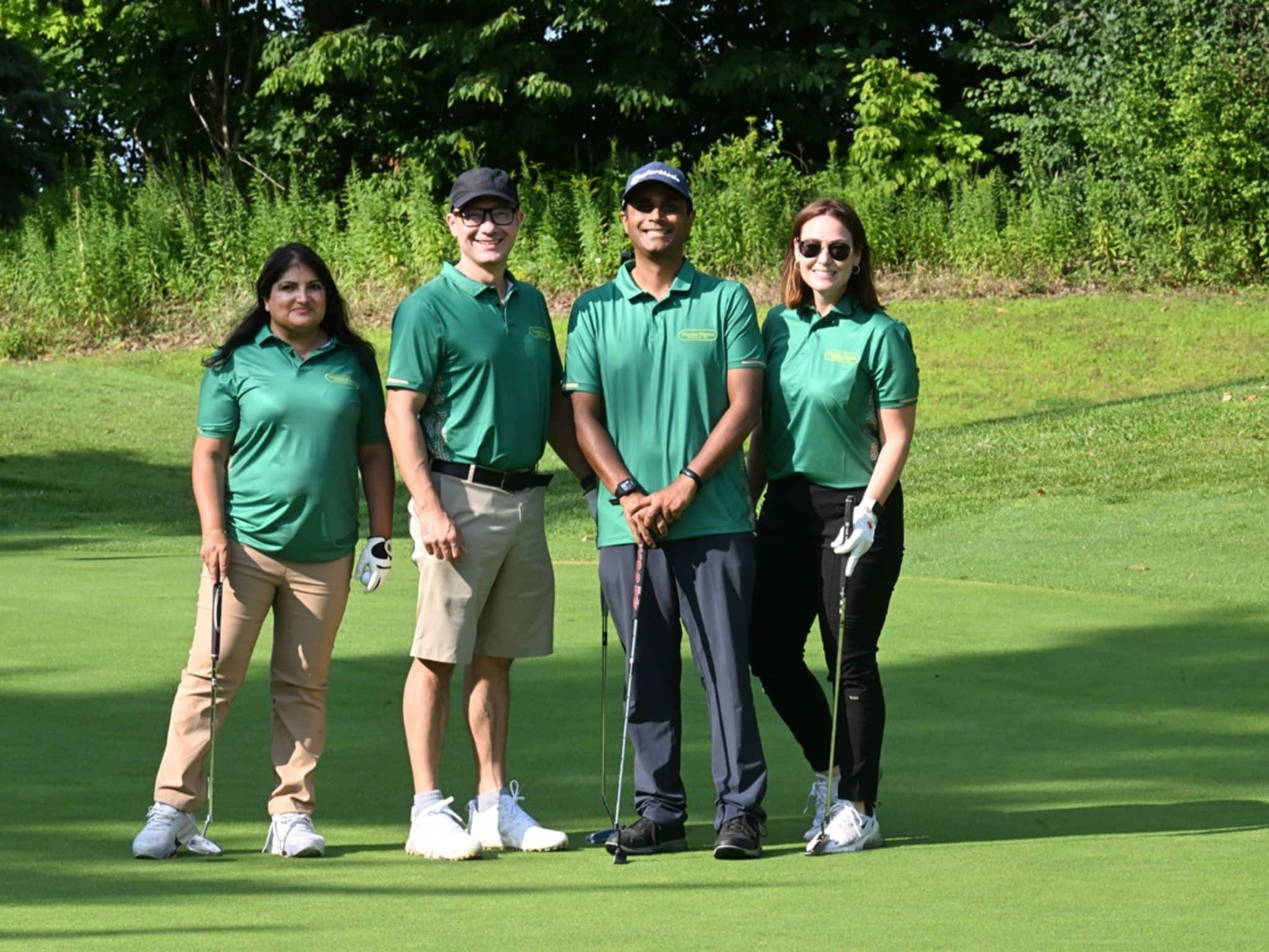 Group of golfers on green