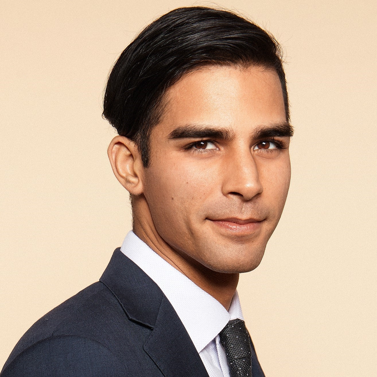 Man in suit with serious expression