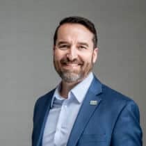 Smiling man in a blue suit