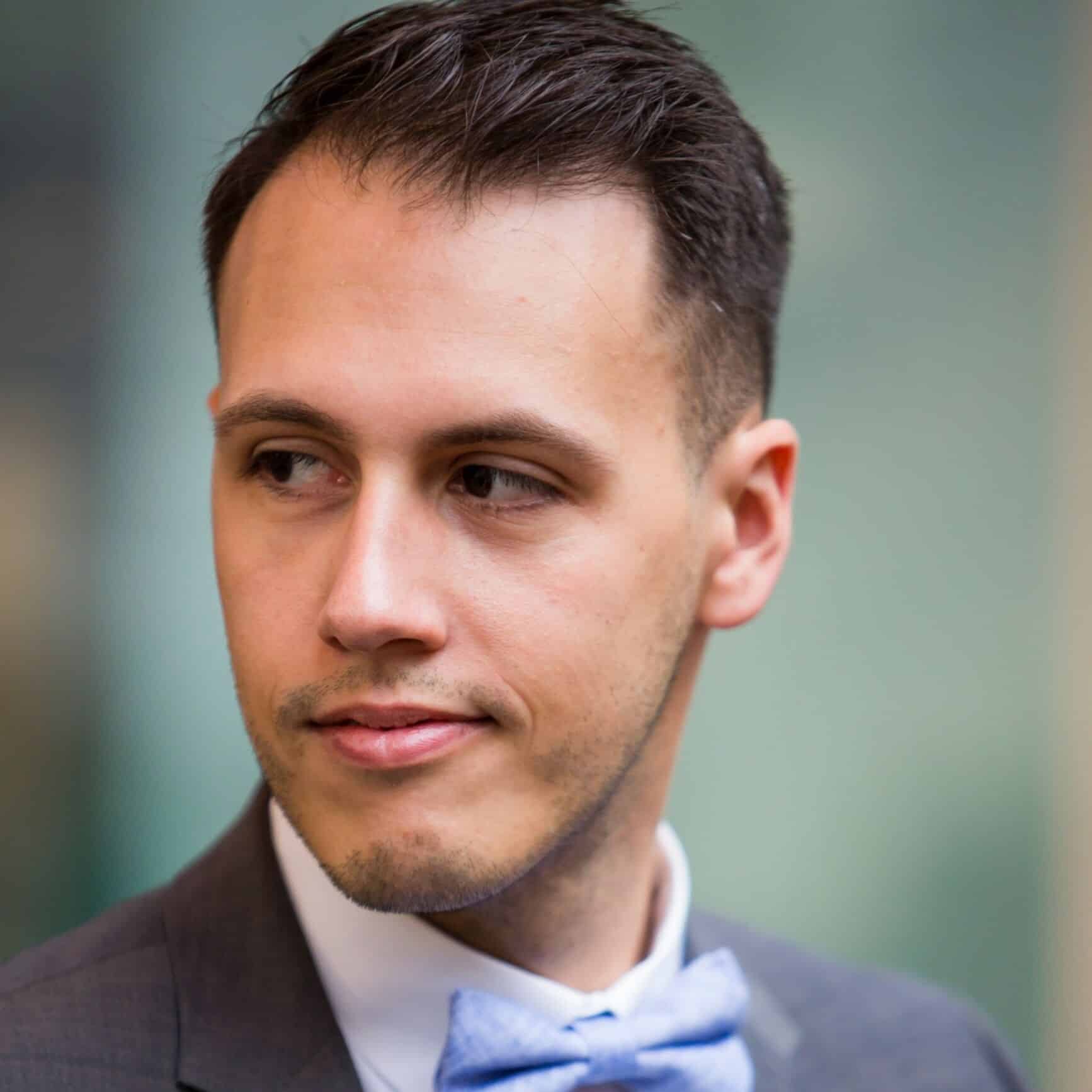 Man in suit with bow tie