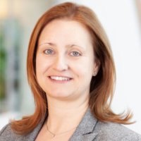 Smiling woman with shoulder-length hair
